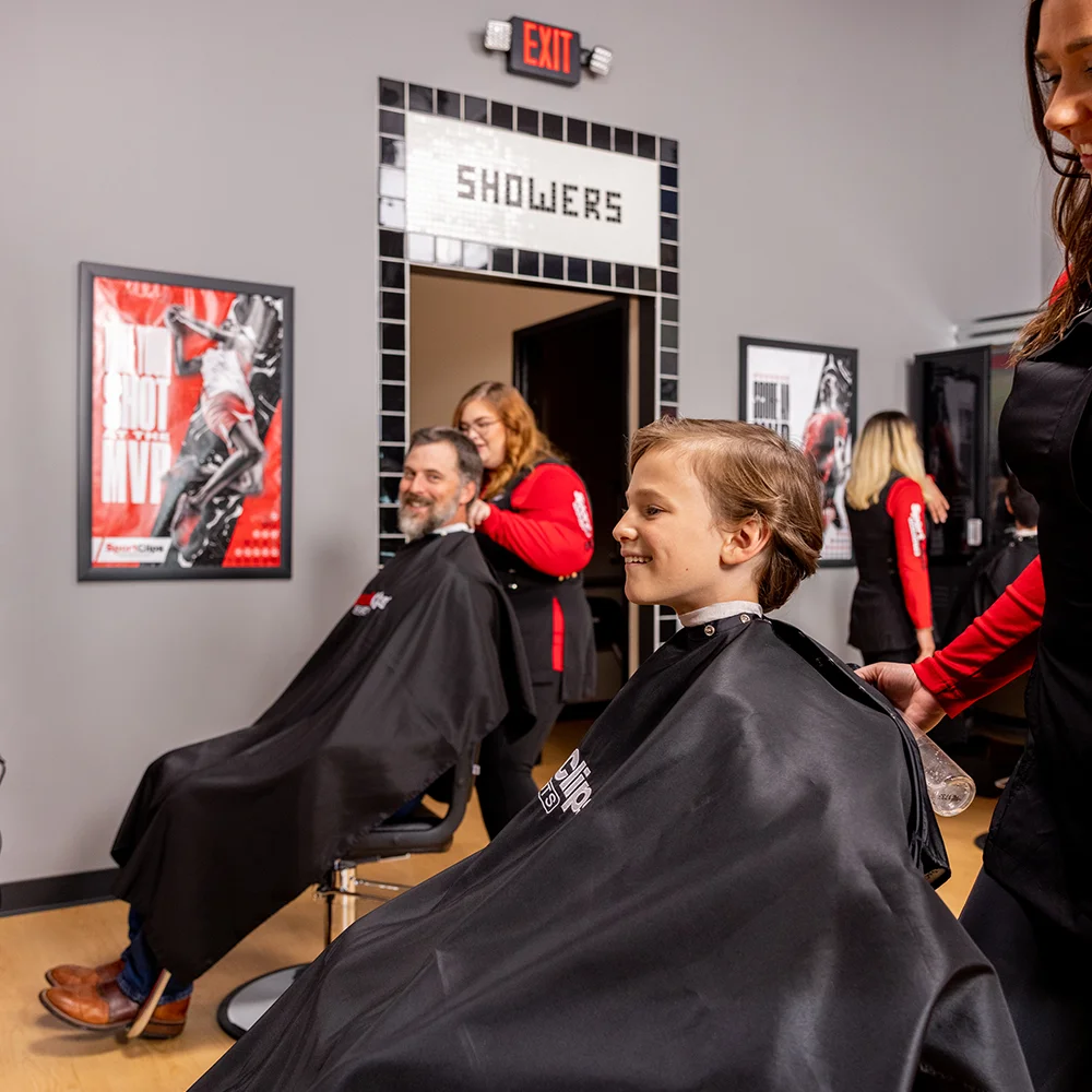 kids-haircut child getting a haircut
