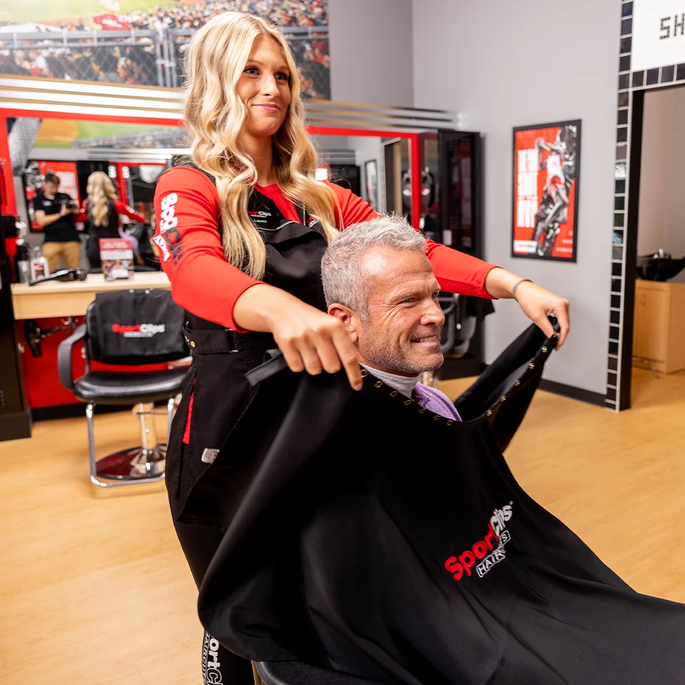 senior-haircut man getting a hair cut